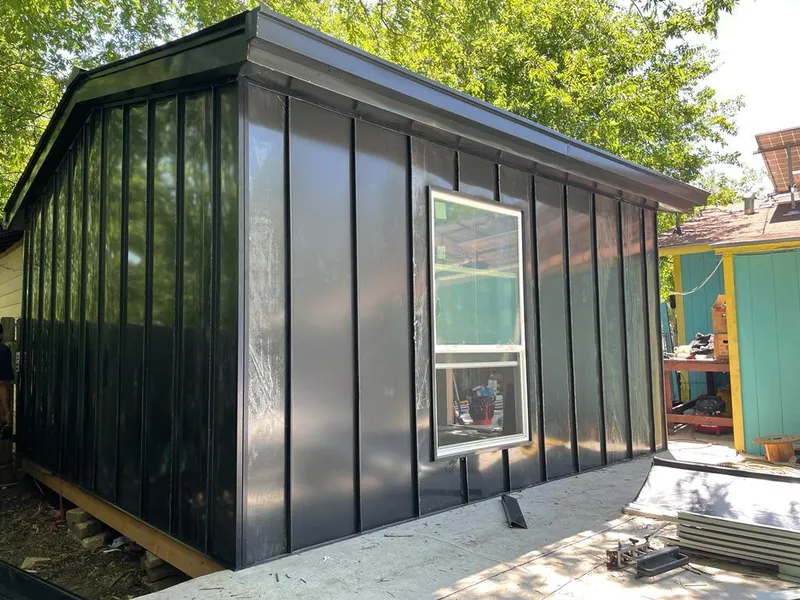Black standing seam metal wall panels for Metal Roof Installation in Mays Chapel